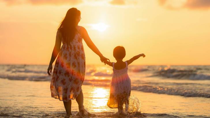 mom and daughter in the sunlight in florida