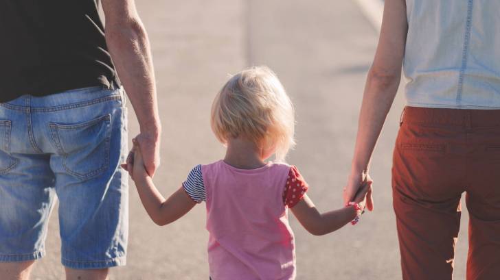 family walking together happy