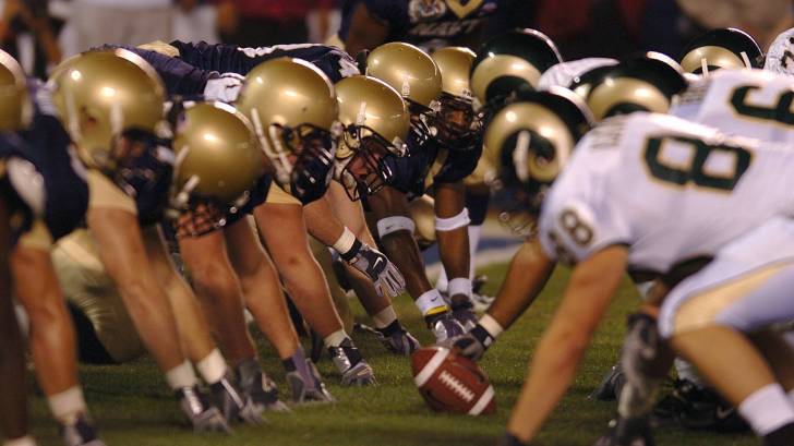 nfl football photo, teams lined up against each other