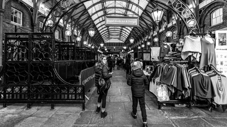 children walking through a london market