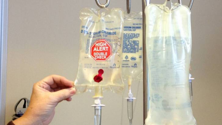 chemo therapy bags hanging from the rack