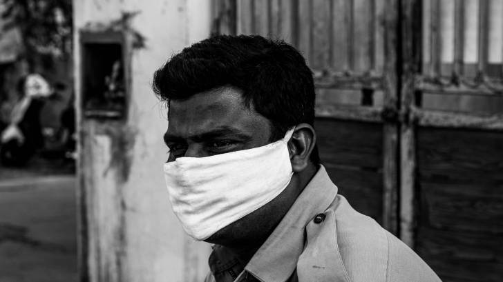 indian man with a mask