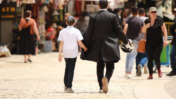 Jewish family walking in Israel