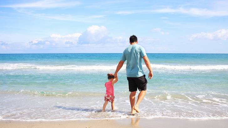 dad and daughter on a Florida beach