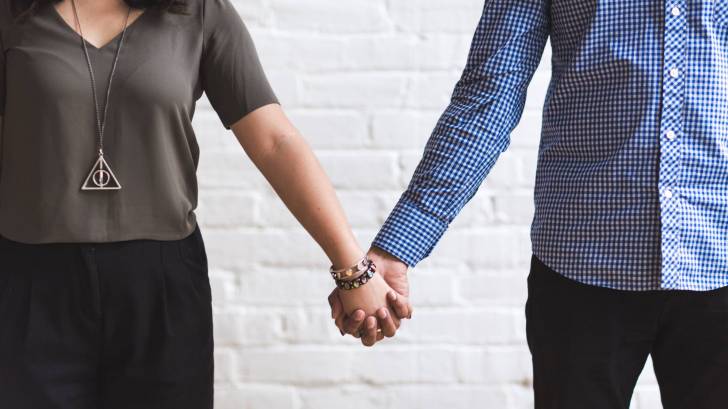 couple holding hands