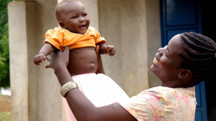 mother with smiling healthy baby