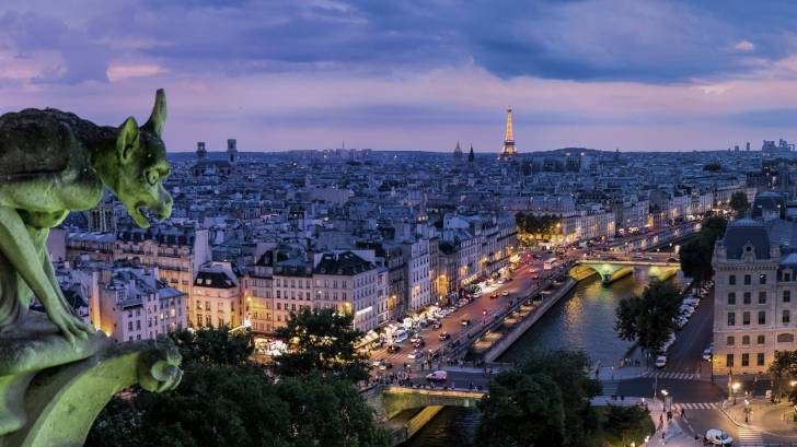 paris at night looking out to the eiffel tower 