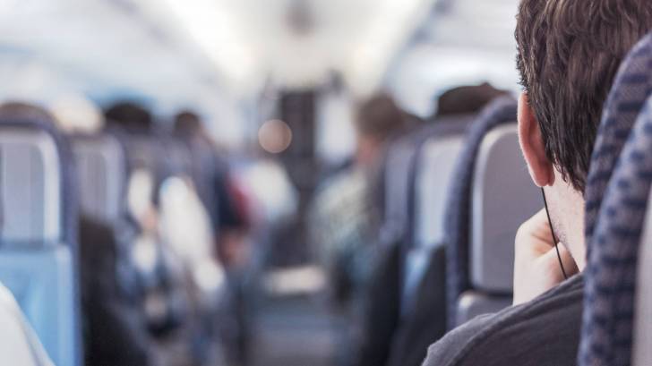 airplane and passengers traveling