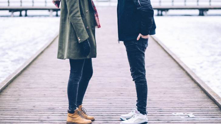 couple on board walk traveling