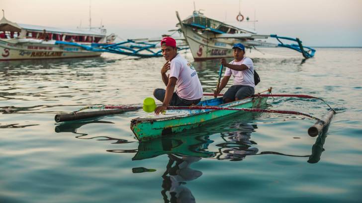 philippine fishermen on a calm sea