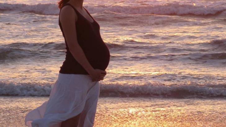 pregnant on beach