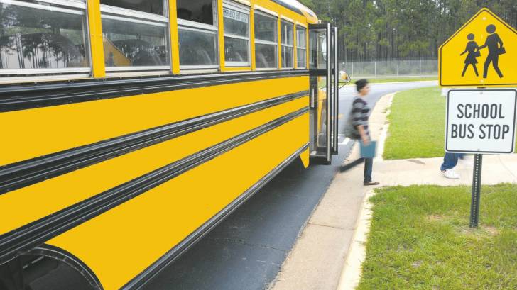 school bus and child