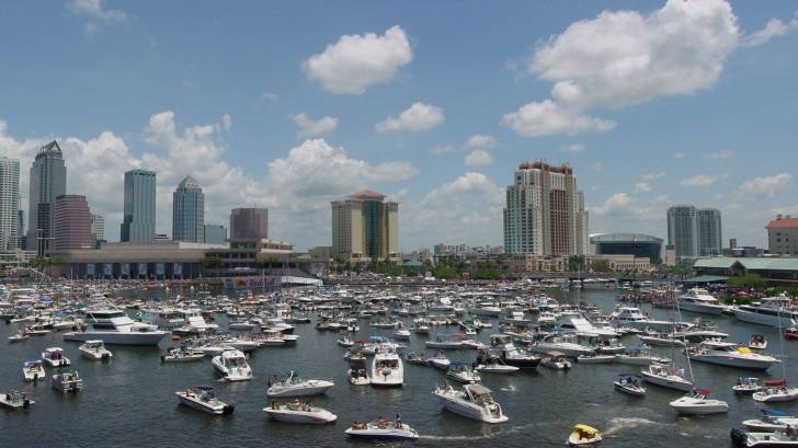 tampa bay filled with boats, looking towards the city skyline