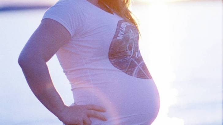 pregnant on a beach