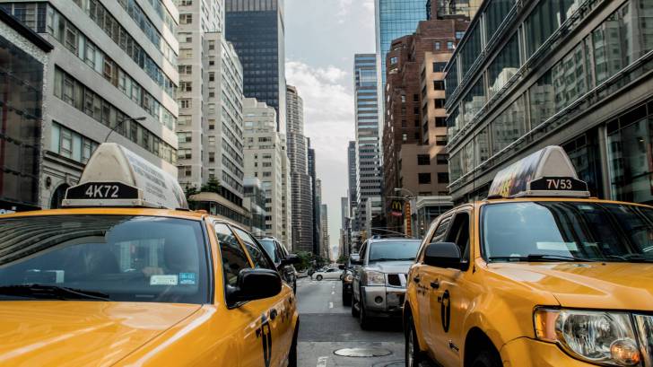 nyc taxi cabs on busy street