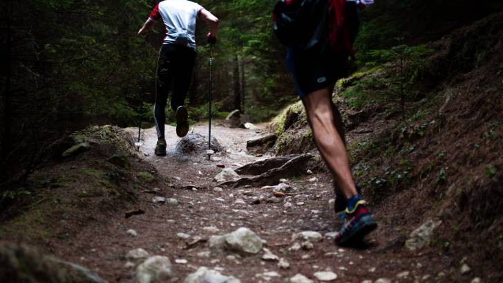 men running a trail