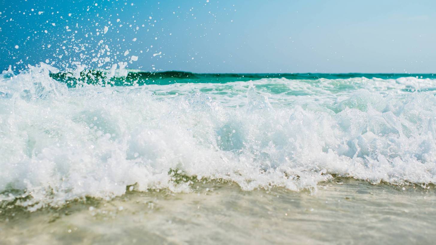 beach ocean surf hitting the beach