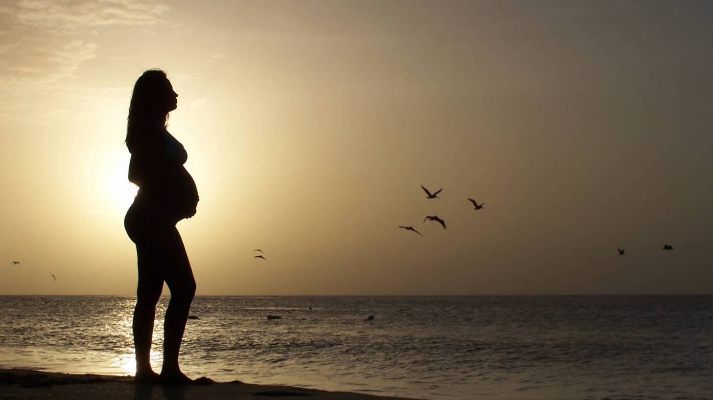 pregnant lady on the beach