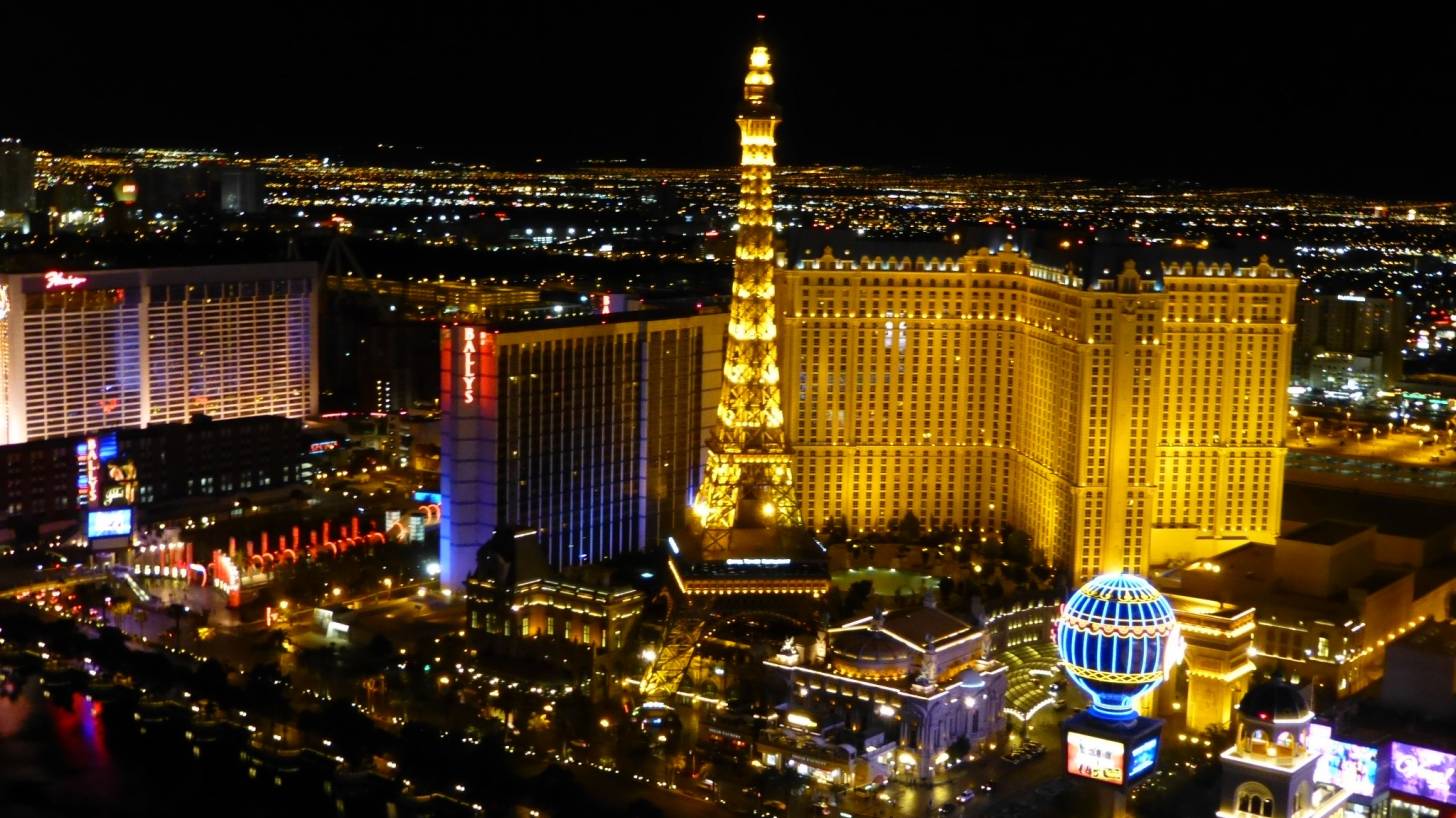 las vegas at night eiffel tower and other buildings