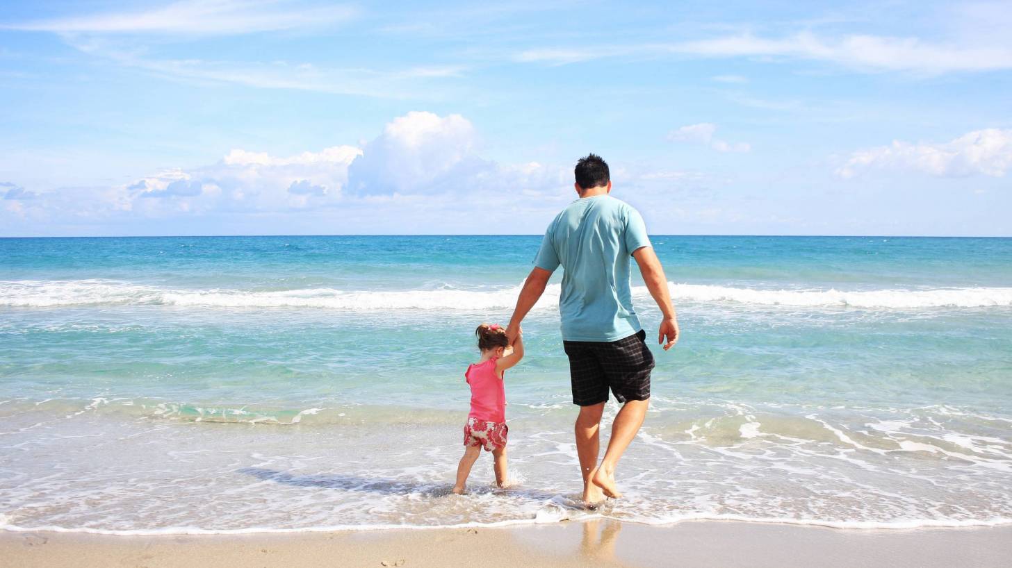 dad and daughter on a Florida beach