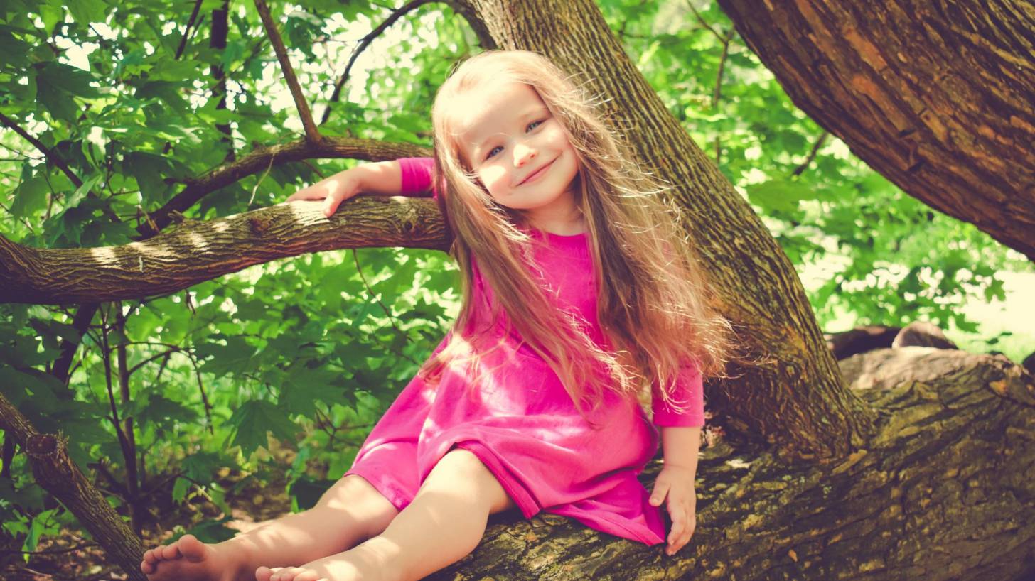 young child sitting in a chair