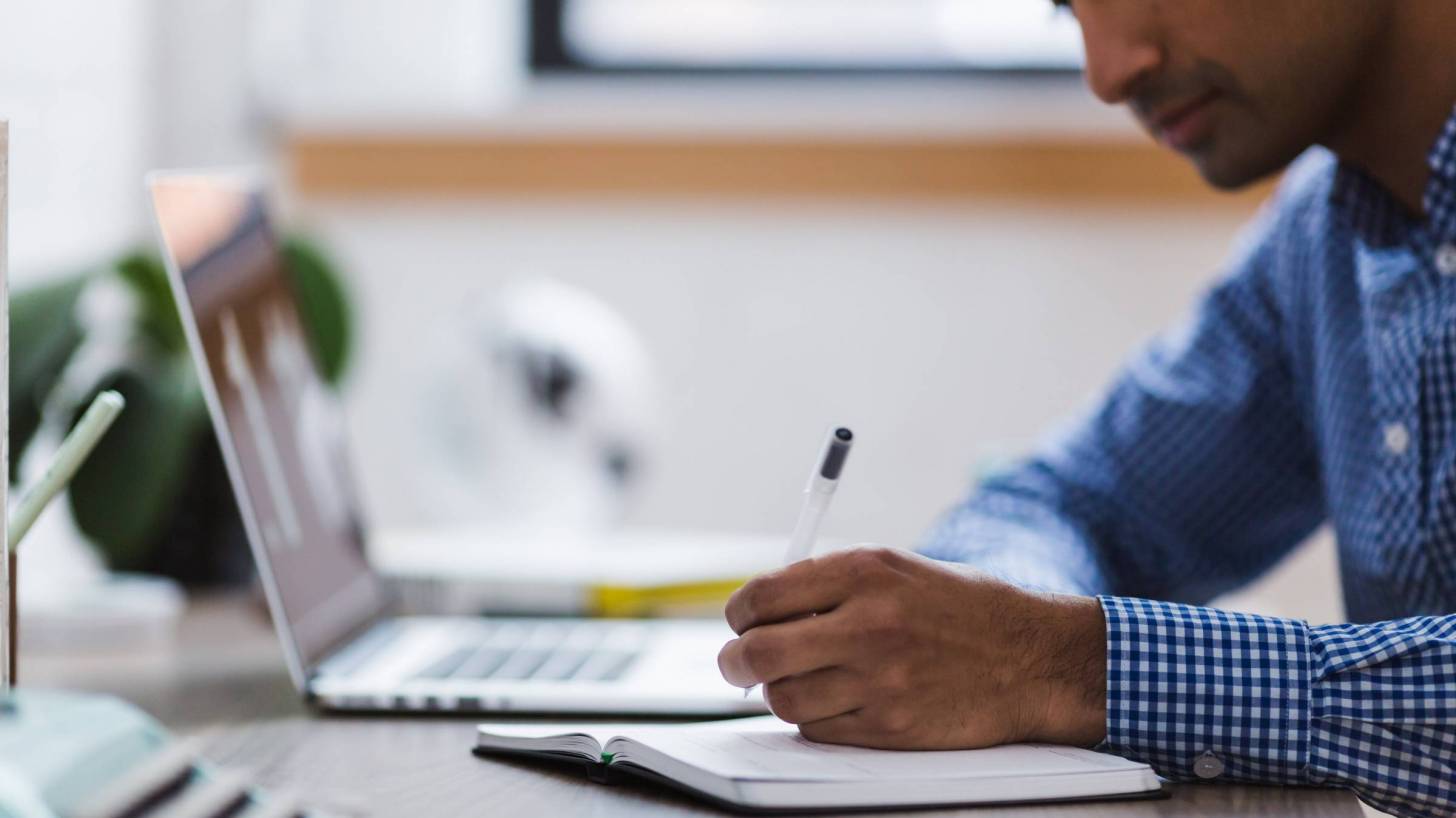 researcher working on laptop