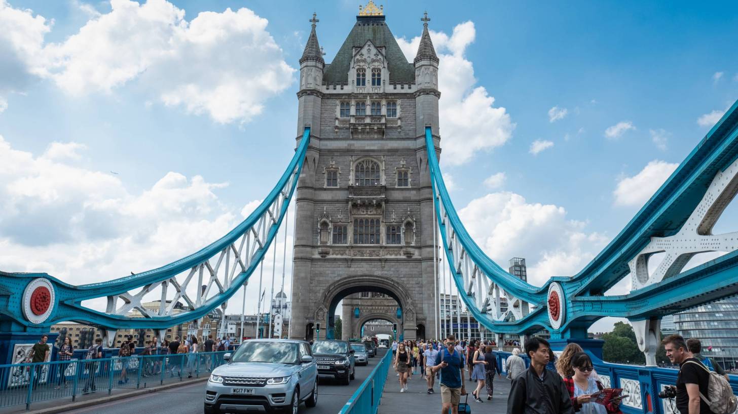 london bridge with people and children walknig on it