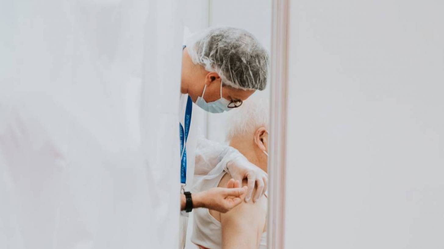 man getting a vaccine