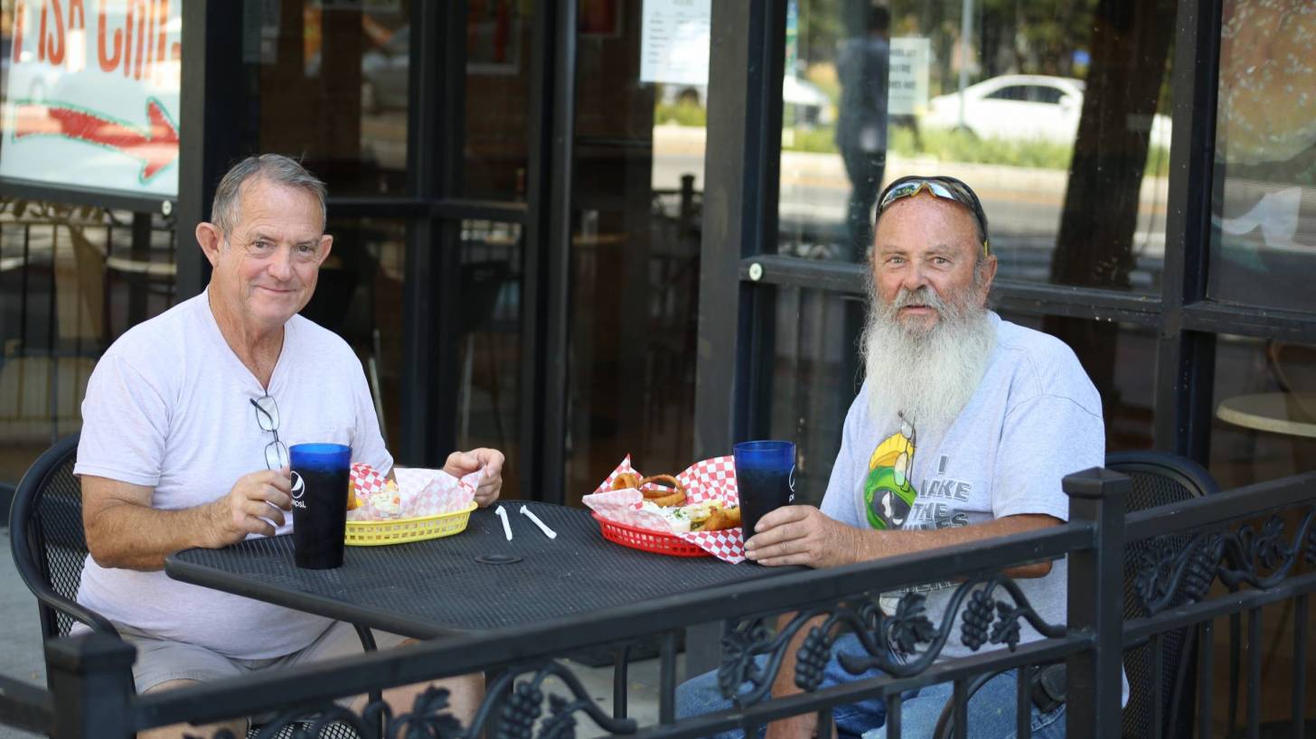 men enjoying lunch