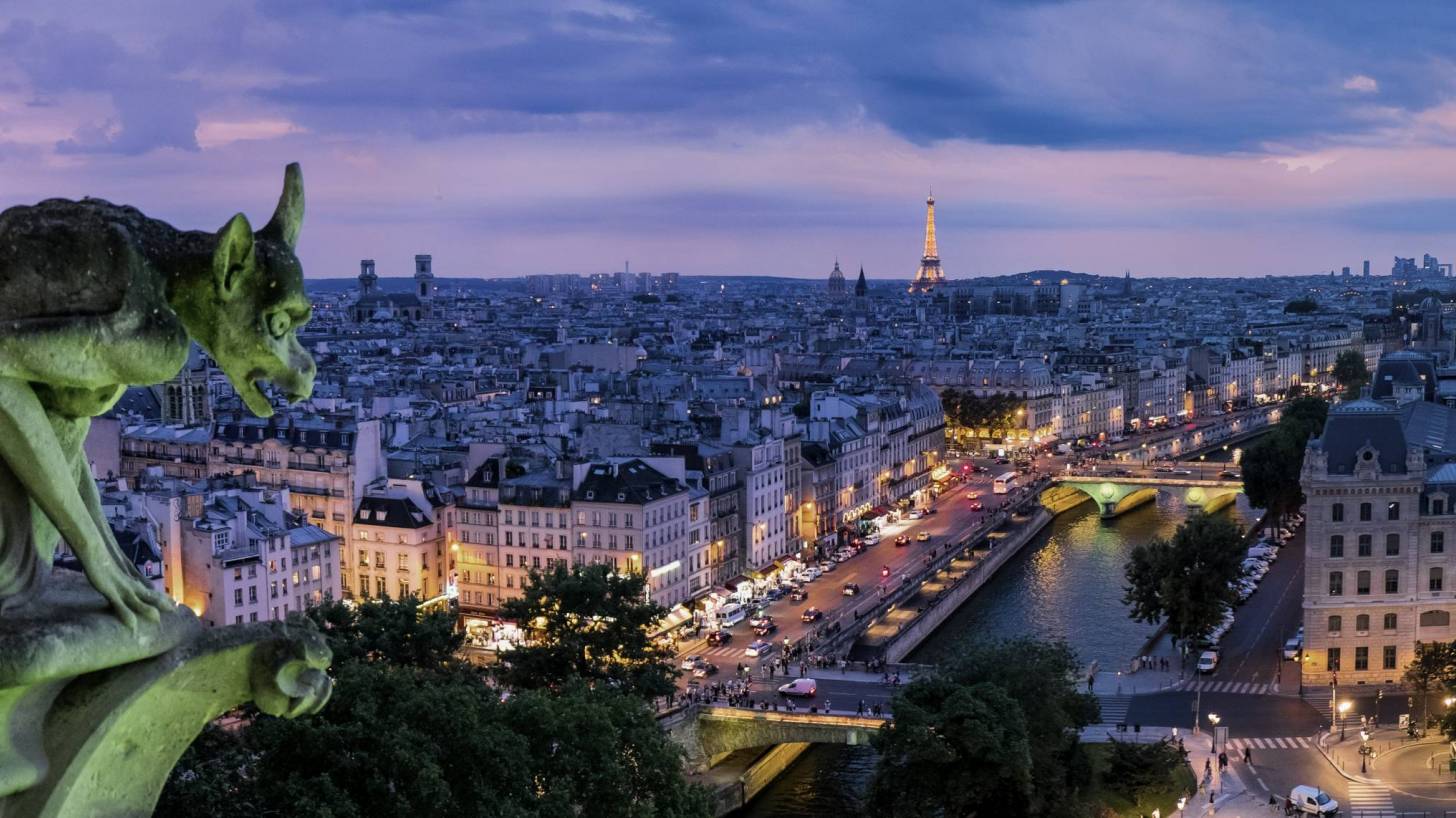 paris at night looking out to the eiffel tower 