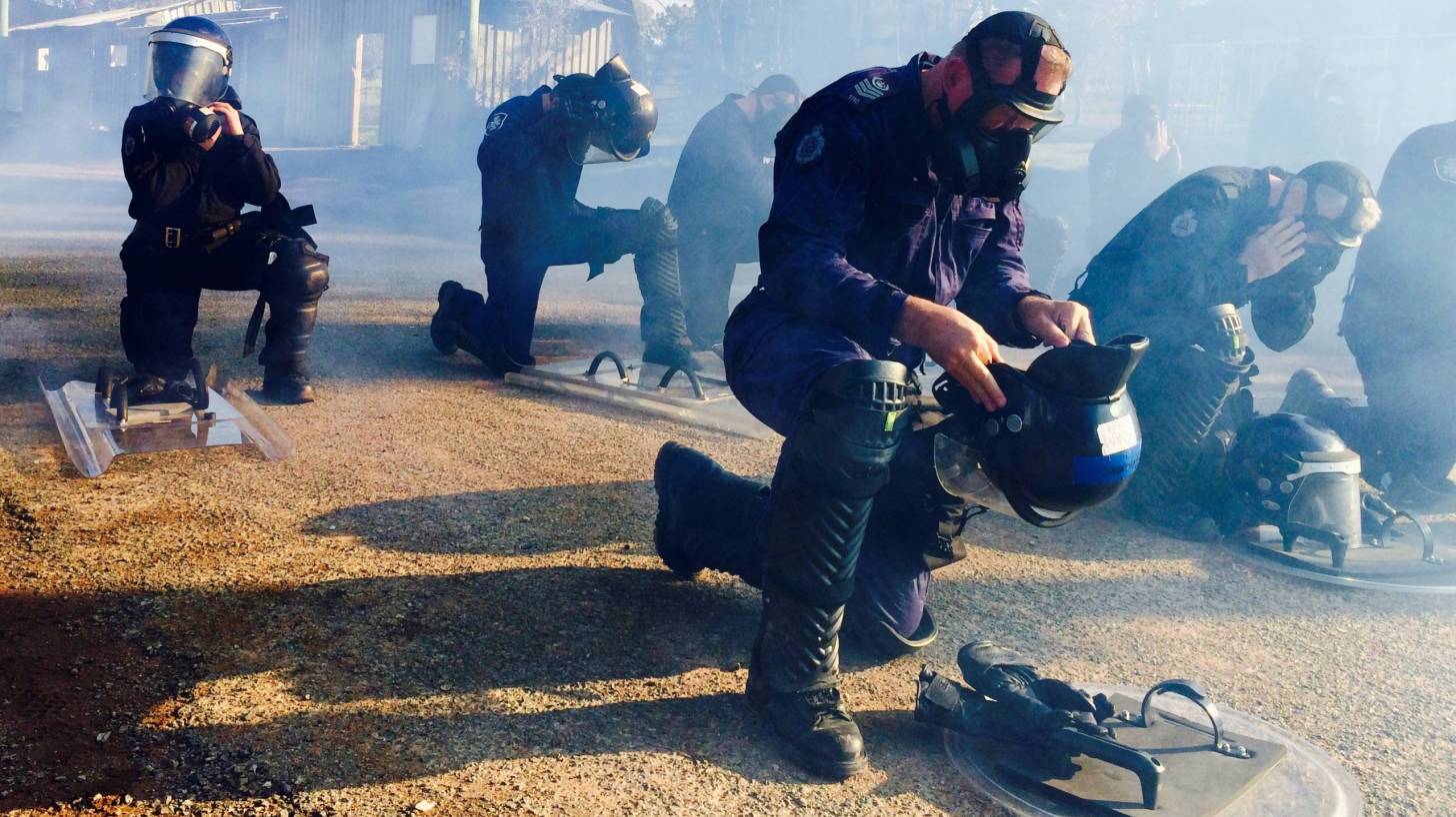 gas masks with police