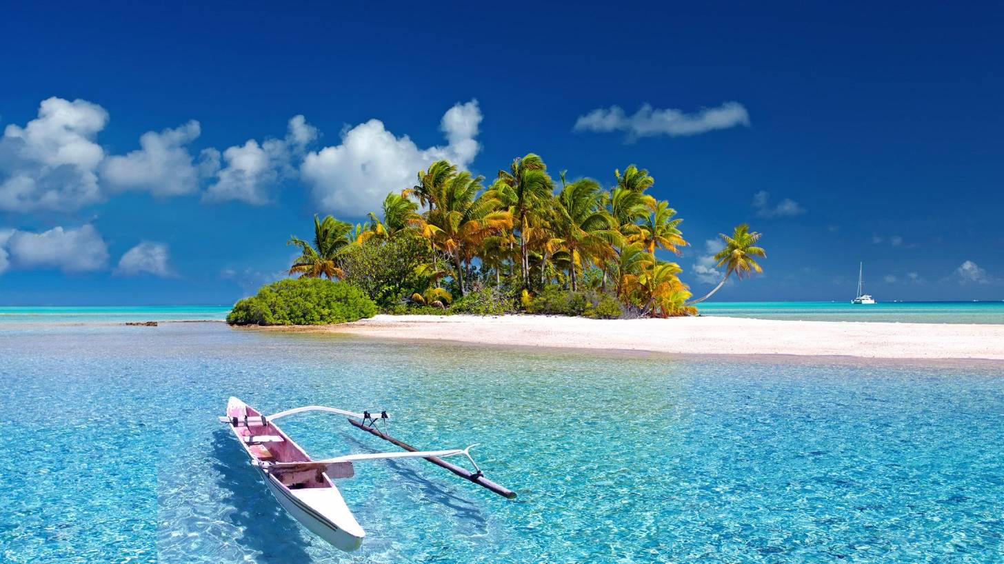 polynesian island with an outrigger