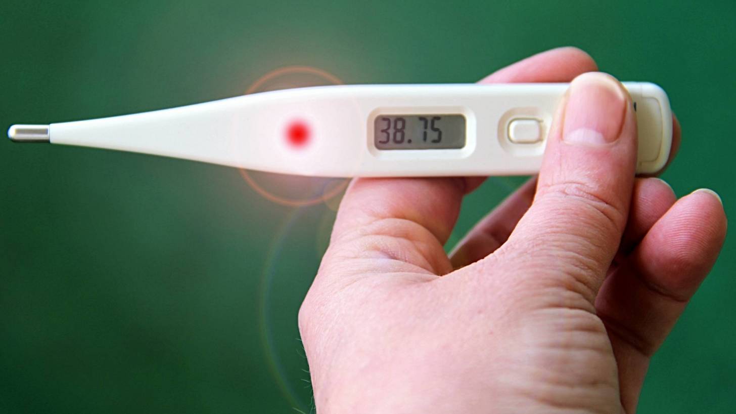 thermometer registering a fever, 37.5 c