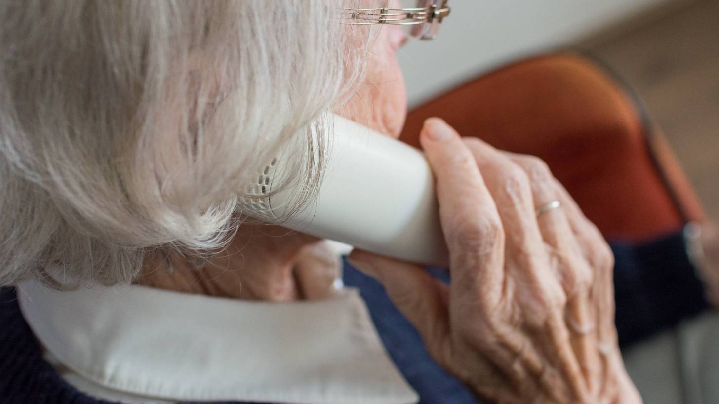 old woman on the phone with her pharmacist