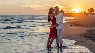 couple hugging on the beach