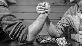 men arm wrestling