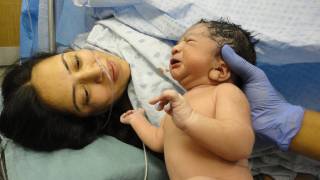 new born baby and mom in the hospital