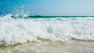 waves crashing on the beach