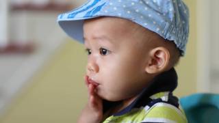 asian boy blowing a kiss