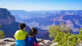 children at the grand canyon rim