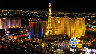 las vegas at night eiffel tower and other buildings