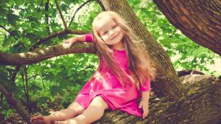 young child sitting in a chair