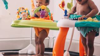 young children in bouncy seats