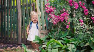 little girl in a garden